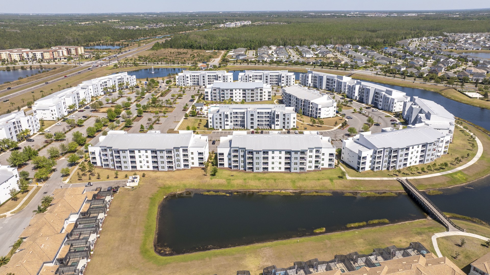 3121 Paradox Circle Unit 303 condo with lake view at Storey Lake Resort Kissimmee — 2 bedroom Florida short-term rental investment